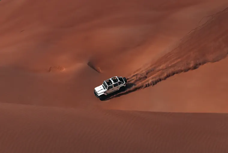 4x4 dune bashing on the red dunes during a VIP red dune safari in Dubai